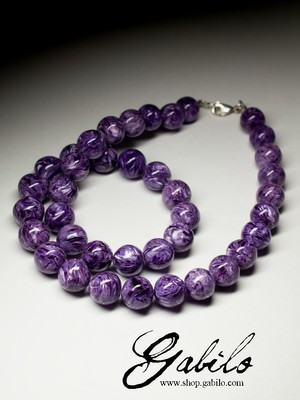 Beads of Charoite variety Extra