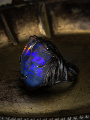 Silver ring with dark Neon Opal