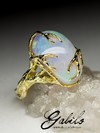 Golden ring with opal