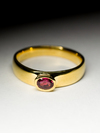 Red sapphire gold ring